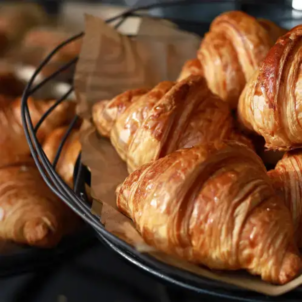 Warm Croissant Candle in Amber Jar