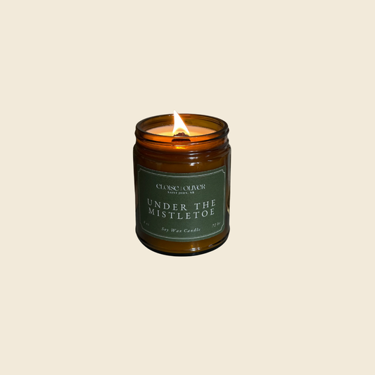 Under the Mistletoe Christmas Candle